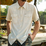 The Wyatt Pearl Snap Short Sleeve Solid Shirt: Washed Indigo Chambray / Medium
